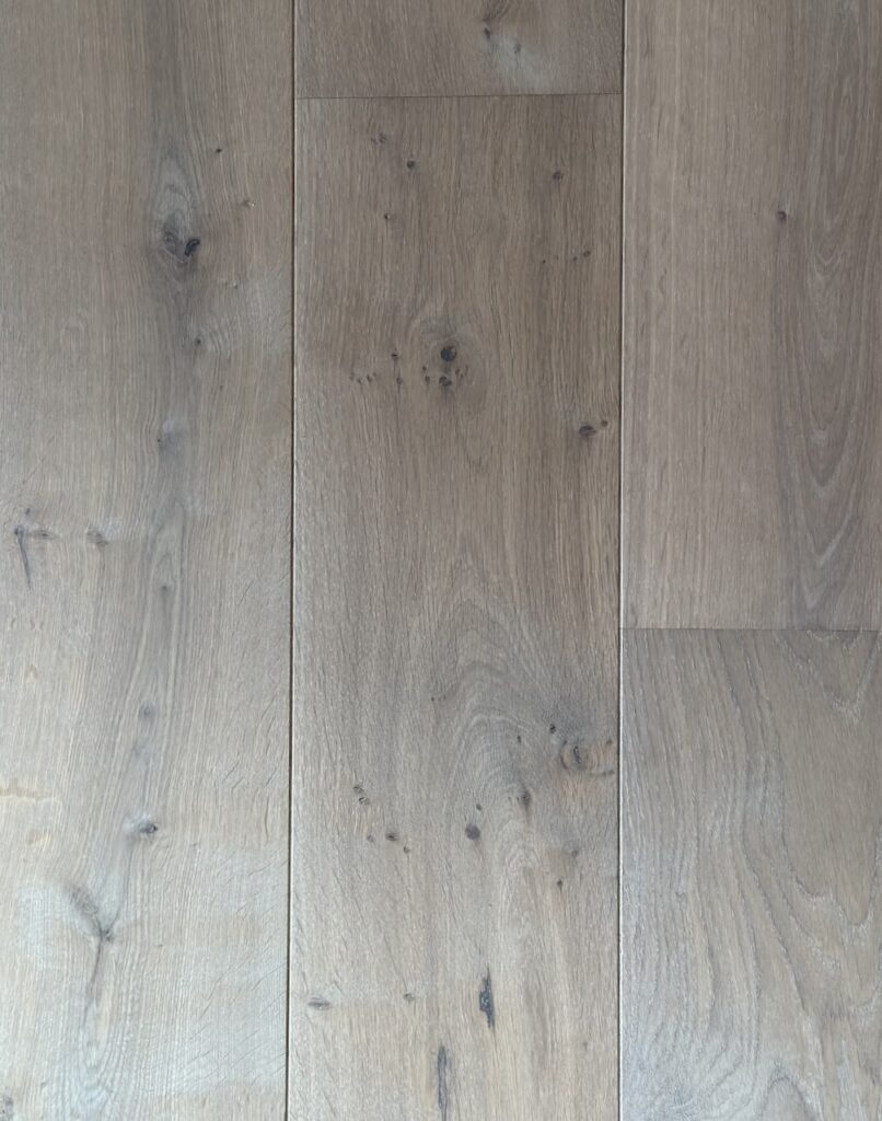 Oiled Wood Floor light grey chalk oil natural oak colouring. close up