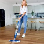 Bona Wood Floor Spray Mop wide image in use spraying timber floor