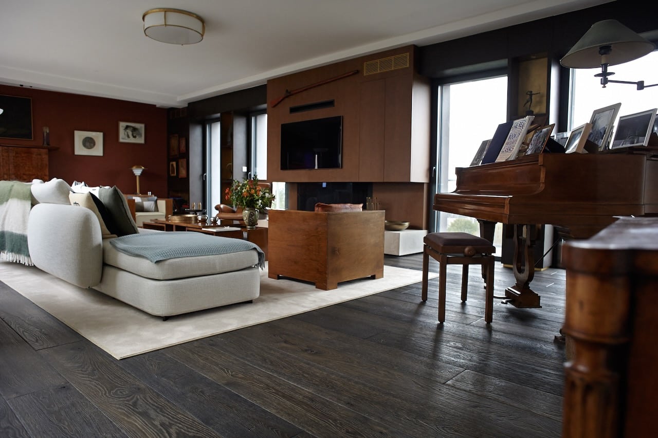 Custom flooring import thermal treated timber floor dark brown in living room with piano