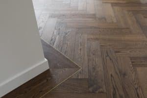 Herringbone Timber Flooring with brass insert - 29