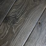 Renaissance N7 oak flooring, featuring XVIII century style heavy brushing and artisanal reactive stain finish, suitable for elegant interior designs.