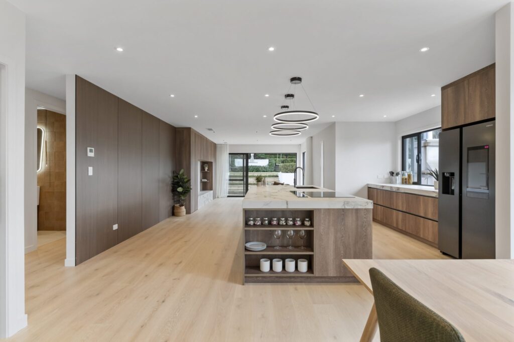 open plan spacious kitchen lifted by European oak floors - wide planks and mid colour tone