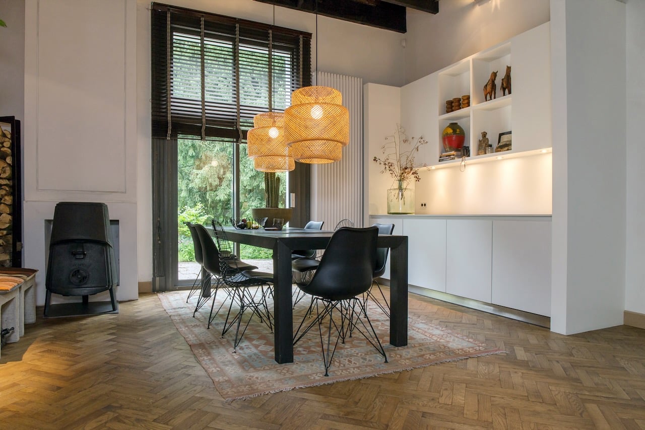 oiled herringbone timber floor in open kitchen and dining room with high ceiling