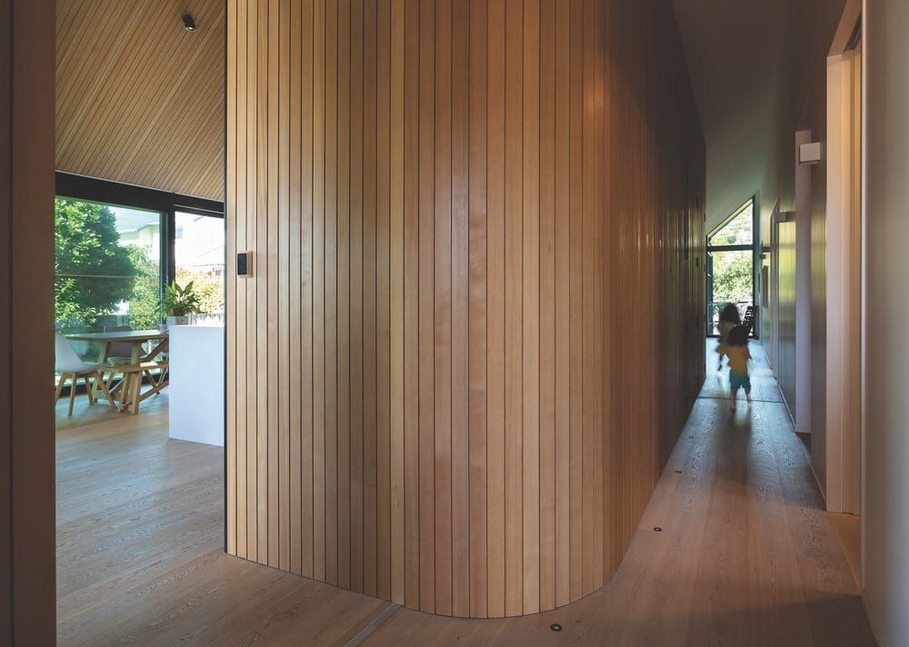 Natural oiled wood flooring and timber wall feature in Christchurch home